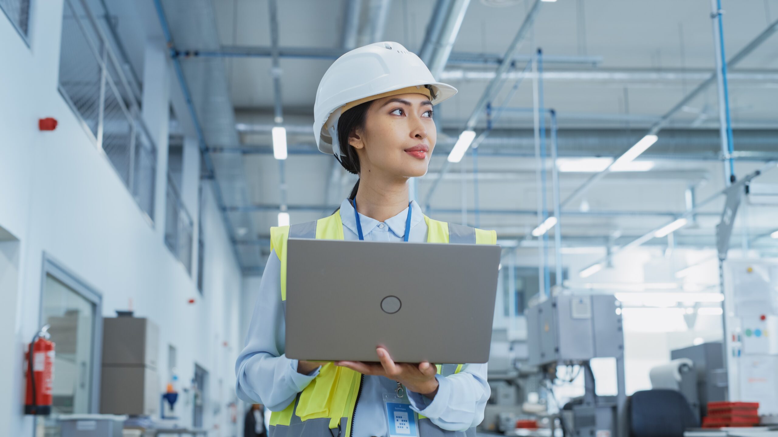 A,Happy,And,Smiling,Asian,Female,Engineer,In,White,Hard